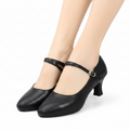 Black leather Mary Jane high heels shown on a model's feet, featuring a low block heel and a single ankle strap with a silver buckle. The image includes text overlays indicating the color is black and the height is 5.